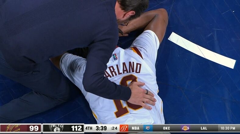 Darius Garland gets hurt, as Kyrie Irving landed on his head