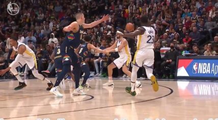 Draymond Green hits Klay Thompson in the head with the ball