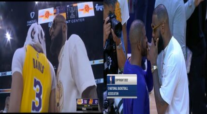 LeBron James walks past teammates to shake hands with CP3