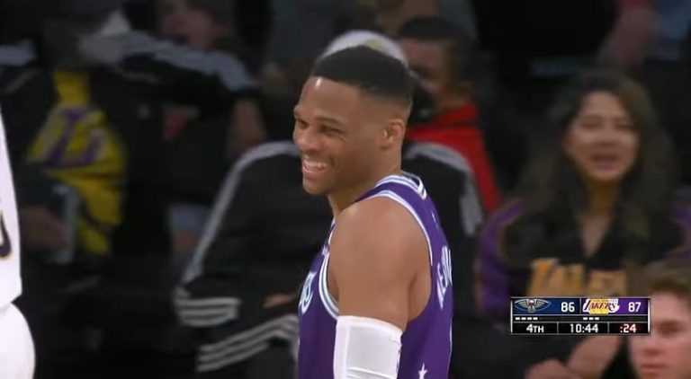 Russell Westbrook laughs after he airballs shot and clock expires