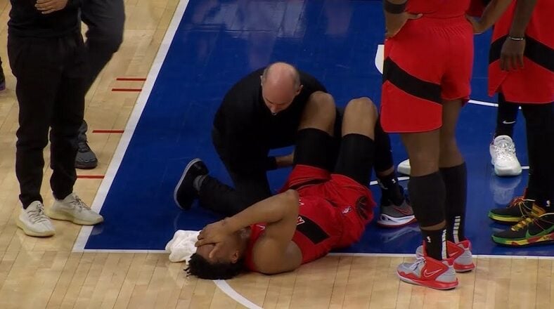 Scottie Barnes cries and carried off court after Joel Embiid injured his ankle