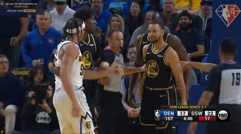 Stephen Curry gets into it with Aaron Gordon for elbowing Draymond