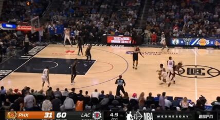 Terance Mann collapses on the court after colliding with Bismack Biyombo