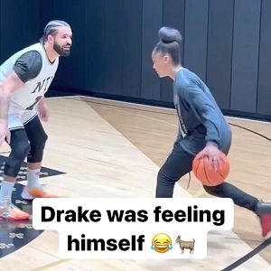 Drake gets crossed up by a girl playing basketball