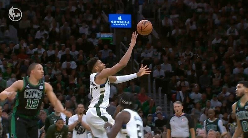 Giannis throws alley oop off the backboard to himself