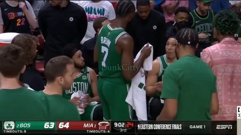 Grant Williams argues with Jaylen Brown and Jayson Tatum in Game 1