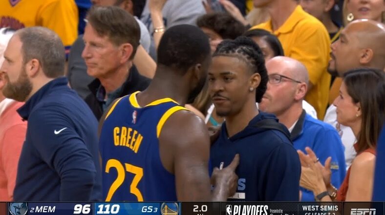 Ja Morant and Draymond Green hug after Warriors win Game 6