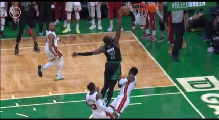 Jaylen Brown tries to dunk on Victor Oladipo but gets offensive foul call