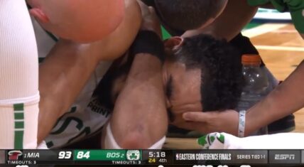Jayson Tatum cries after he hurt his shoulder