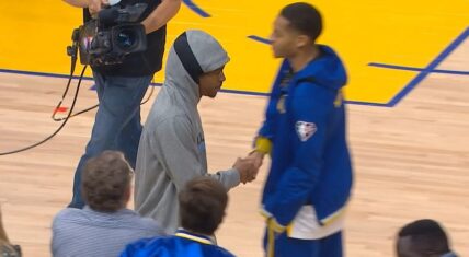 Jordan Poole shakes hands with Ja Morant before Game 4