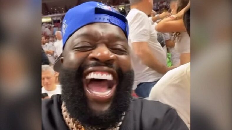 Rick Ross catches ball during Heat - Sixers Game 2