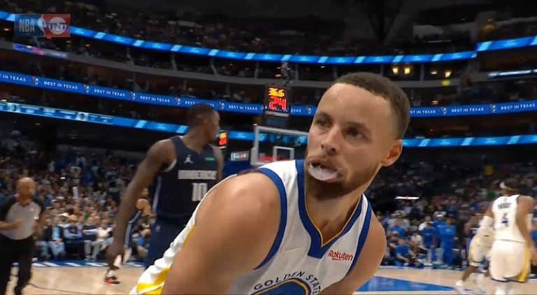 Stephen Curry stares down Reggie Miller after hitting step back three