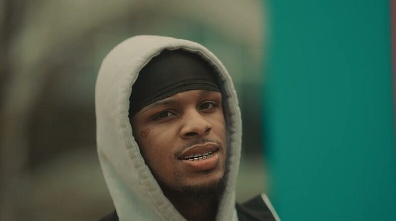 Toosii is still from the gutter but reps in Secrets video