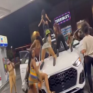 Yaya Mayweather and her friends twerk on a car at the gas station