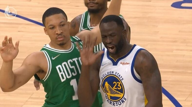 Draymond Green knocks Grant Williams down and elbows his chest