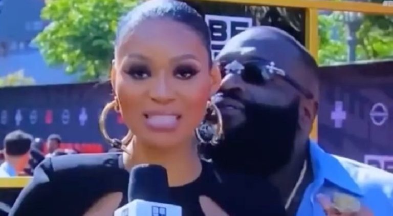 Rick Ross pushes up on Pretty Vee on the BET Awards red carpet