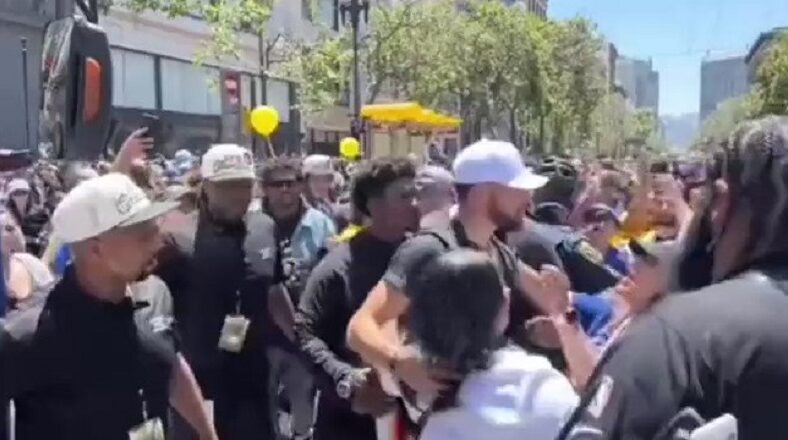 Stephen Curry ducks woman trying to kiss him on the lips