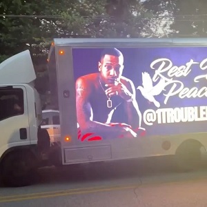 Trouble had his life celebrated with a candlelight vigil in Atlanta