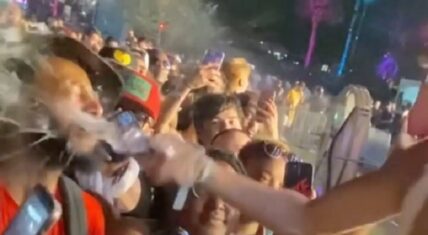 Brittany Renner throws drink in a man's face at Rolling Loud