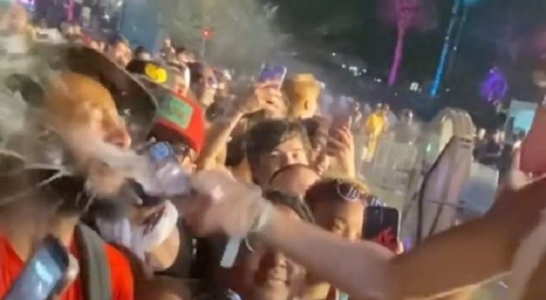 Brittany Renner throws drink in a man's face at Rolling Loud