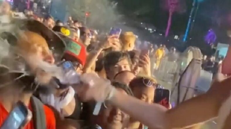 Brittany Renner throws drink in a man's face at Rolling Loud