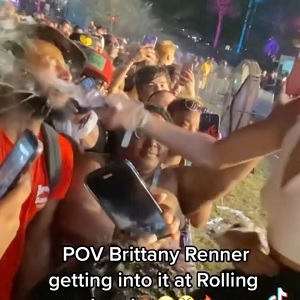Brittany Renner throws drink in a man's face at Rolling Loud