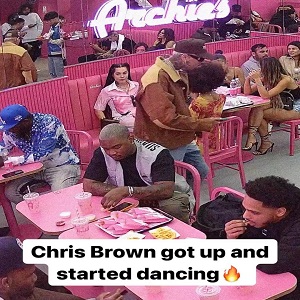 Chris Brown randomly danced in a restaurant and nobody cared