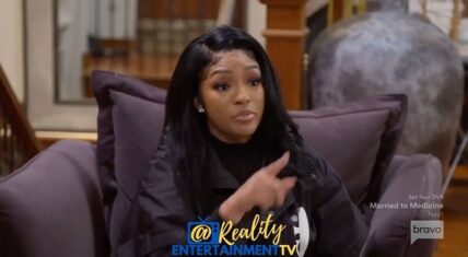 Drew Sidora throws a dog treat at Fatum Alford on RHOA