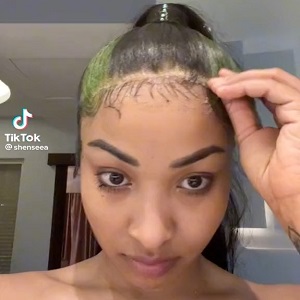 Shenseea shares video of her taking her wig off