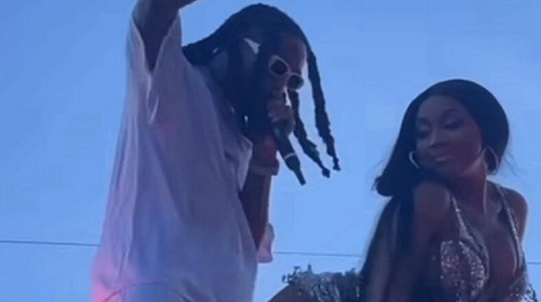 Yung Miami twerks on Quavo during Rolling Loud performance