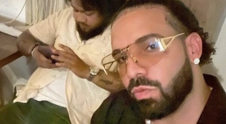 Drake shows off new hairstyle with perm and man bun