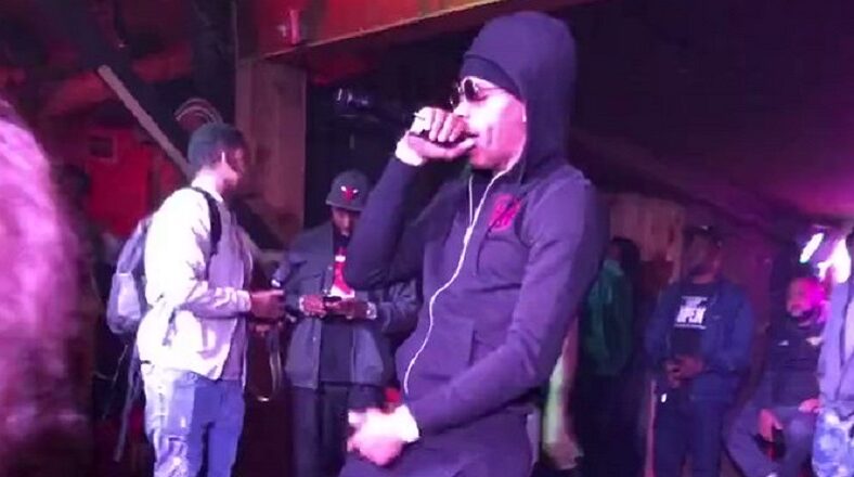 Man put money in Lil Baby's pocket while he was performing