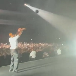 Devin Booker hits jump shots on stage with Jack Harlow