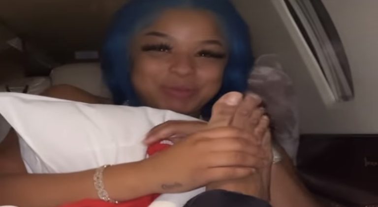 Chrisean Rock plays with Blueface's foot on jet