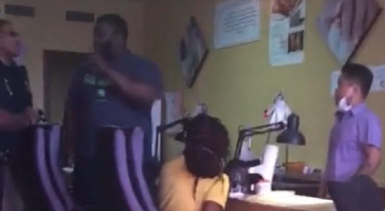 Black man checks Asian salon owner for disrespecting his daughter