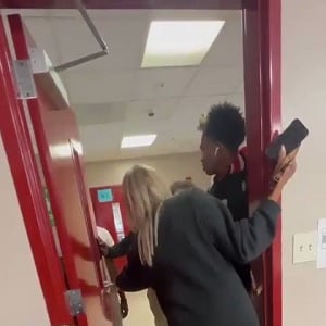 Male student assaults female teacher for closing door on his hand
