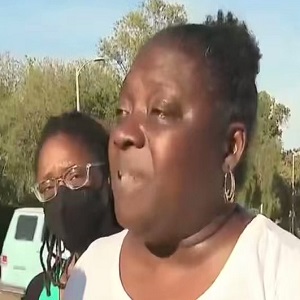 Mother throws up gang sign after saying her son was shot