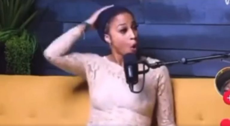 Whitney Davis' wig falls off in the middle of her interview