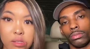 Asian woman gifts Black friend watermelon and grape juice