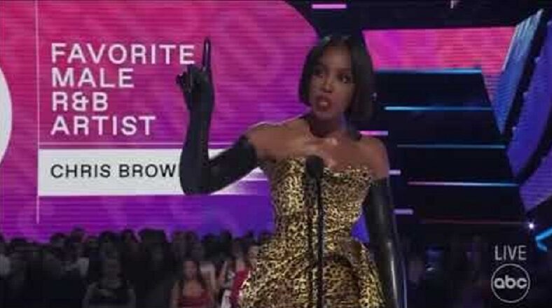 Kelly Rowland checks fans for booing Chris Brown at the AMAs