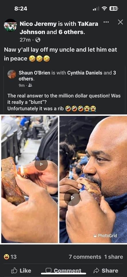 Man uses lighter to warm a rib during Bayou Classic