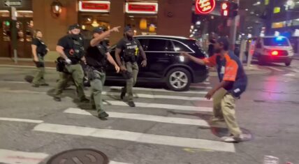 Black cop punches a Black man in the face and won't be charged