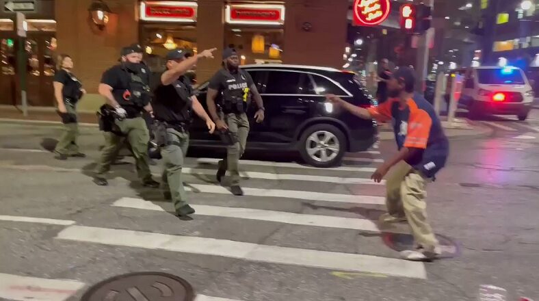 Black cop punches a Black man in the face and won't be charged
