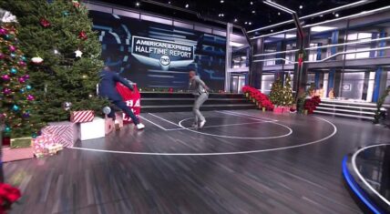 Kenny Smith pushes Shaq into Christmas tree on set