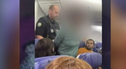 Woman claims Jesus told her to open airplane exit door