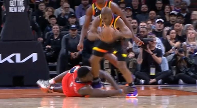 Zion Williamson grabs Chris Paul's foot and trips him