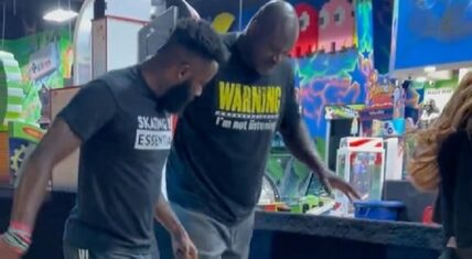 Shaq tries to learn how to moonwalk in skates