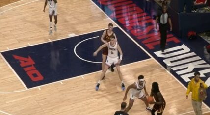 Uber eats worker delivers food to referee during basketball game