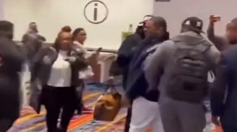 Busta Rhymes throws bottle of water at woman for touching his butt