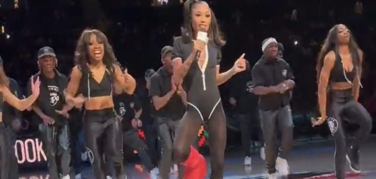 Coi Leray wears MSCHF Big Red Boots during show at Nets game
